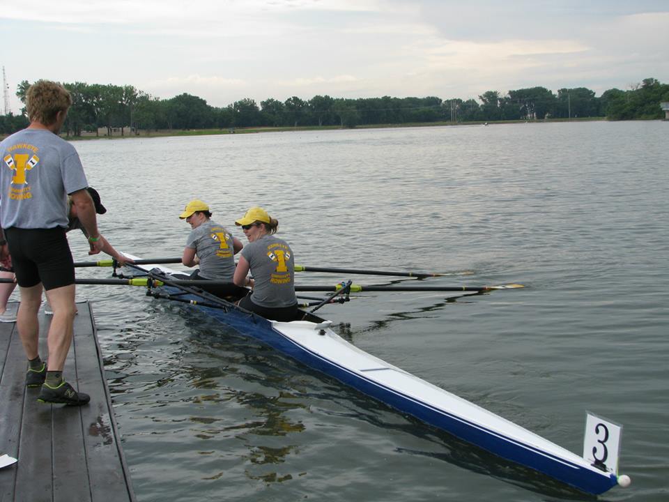 Rowers docking in a double scull
